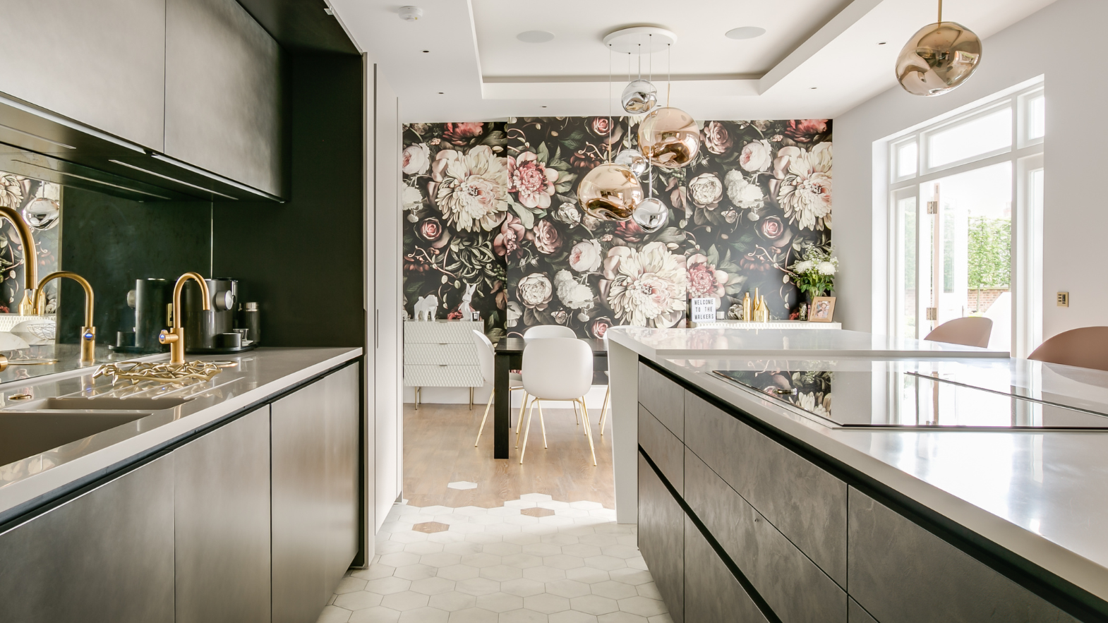 Frosted marble and honey oak LVT flooring in a kitchen
