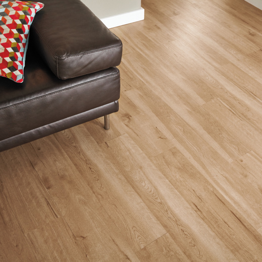 Van Gogh Birch dark brown lvt flooring laid in a living room