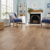 Honey Oak lvp floors in a living room; availabile in gluedown and rigid core