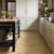 Wells Acacia light brown herringbone LVT flooring in a kitchen